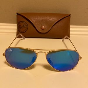 Ray-Ban Polarized Aviator Sunglasses-gold with blue reflection.